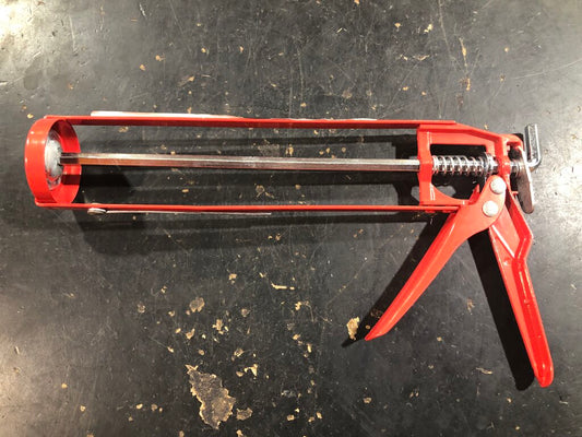 Skeleton Caulk Gun
