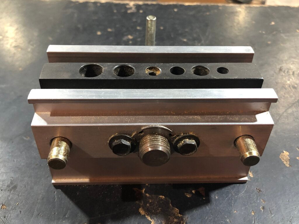 Self-Centering Dowel Drill Guide